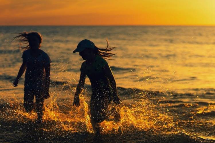 Kids playing on the beach