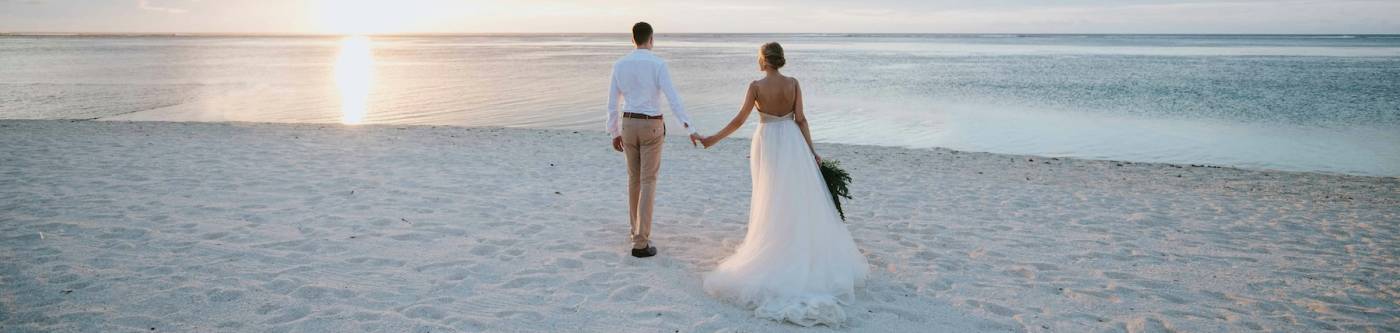 couple on the beach after wedding